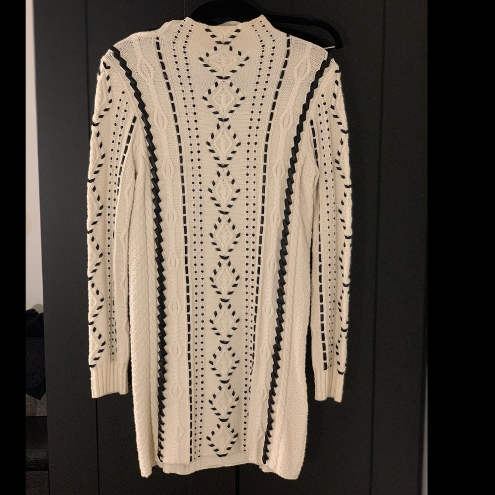 Maje ivory sweater dress with black ribbon